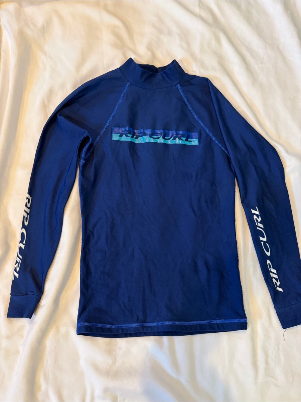 Rip Curl Navy Blue Long-Sleeve Men’s Rash Guard with Teal Logo